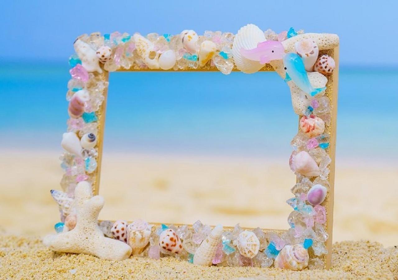 Hotel Monterey Okinawa Spa & Resort Onna Ngoại thất bức ảnh A seashell frame